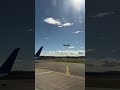 Taxiing  newark airport while another united plane lands a head of us unitedairlines travel