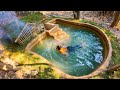 Solo bushcrafts build a warm underground house with a swimming pool