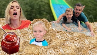 We Filled Our Backyard With Peanut Butter And Jelly And Made A Slide In It.