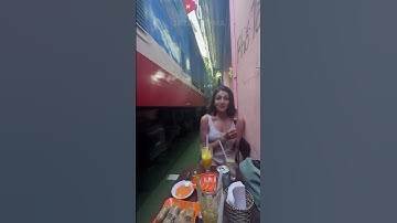 Train gets close to café 😳