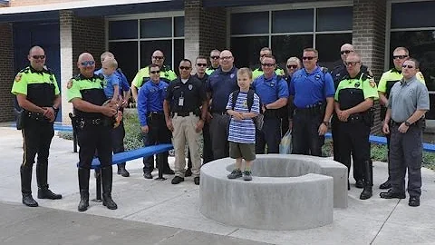 Two Dozen Police Officers Escort Siblings On First Day of School After Dad Died