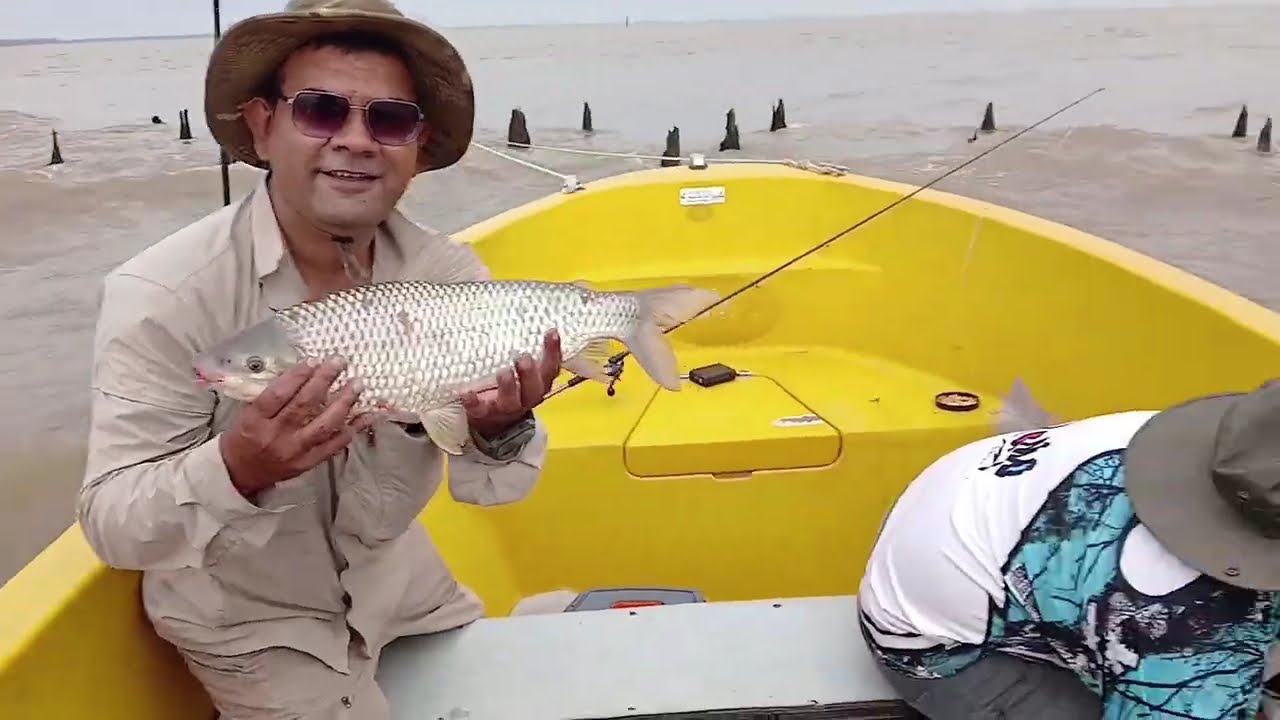 pesca en los malecones en el rio de la plata Berisso, Paraíso de las bogas.