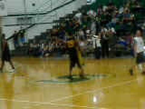 Ryan Mundy and Justin Vincent shooting half court shots