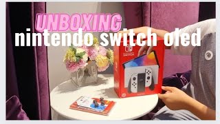 Распаковка второго Nintendo Switch Oled