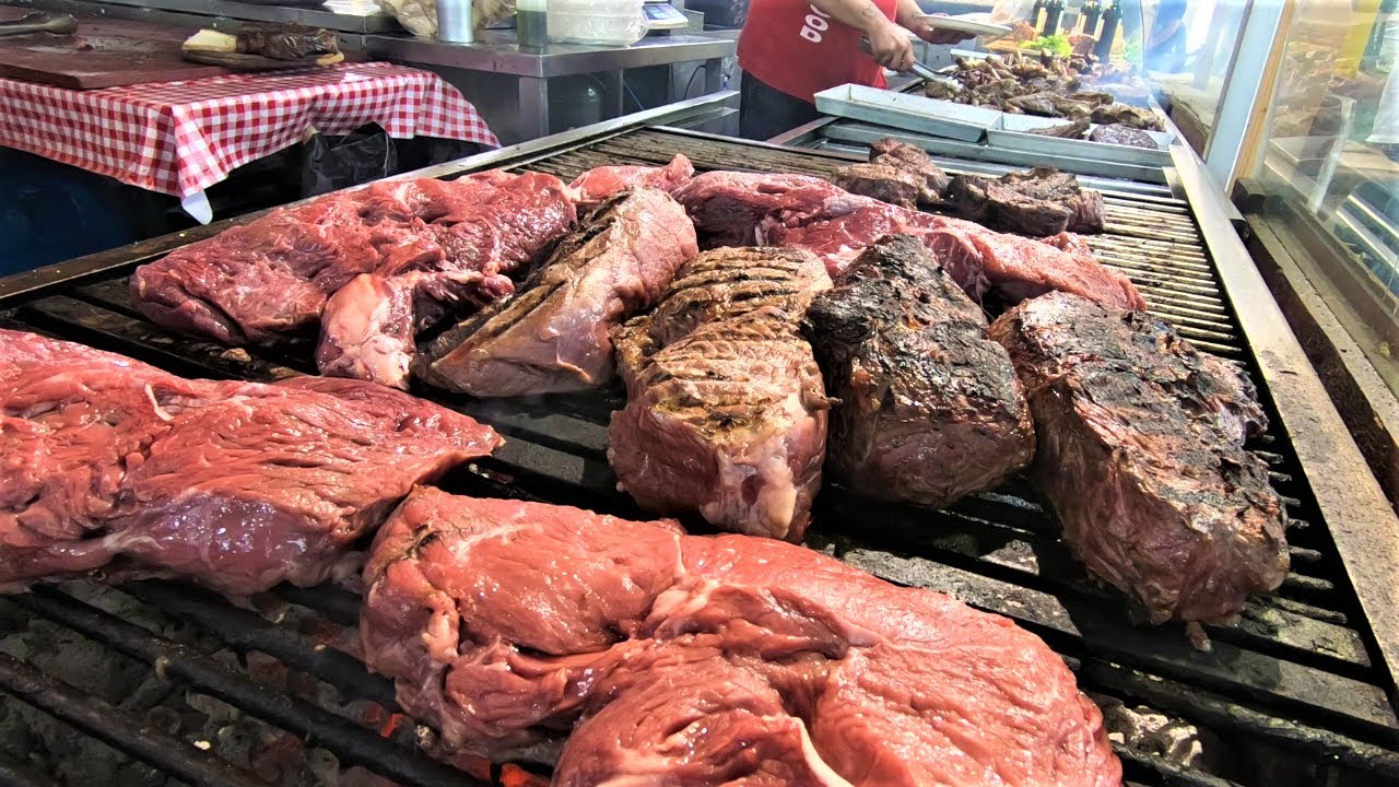 ⁣Giant 'Fiorentina' Steaks. Cutting and Grilling Huge Blocks of Beef Meat. Italy Street Foo
