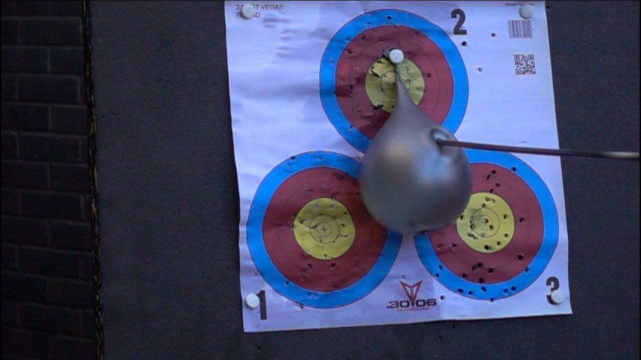 Arrow vs water balloon - burst