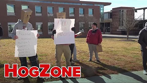 Arkansas fans protest after the hiring of new football coach Ryan Silverfield