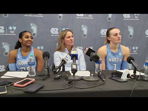 UNC's Deja Kelly, Courtney Banghart and Alyssa Ustby after the Tar Heels' loss to No. 1 S.C.