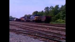 CSX Train Towing Orange Switch Engine