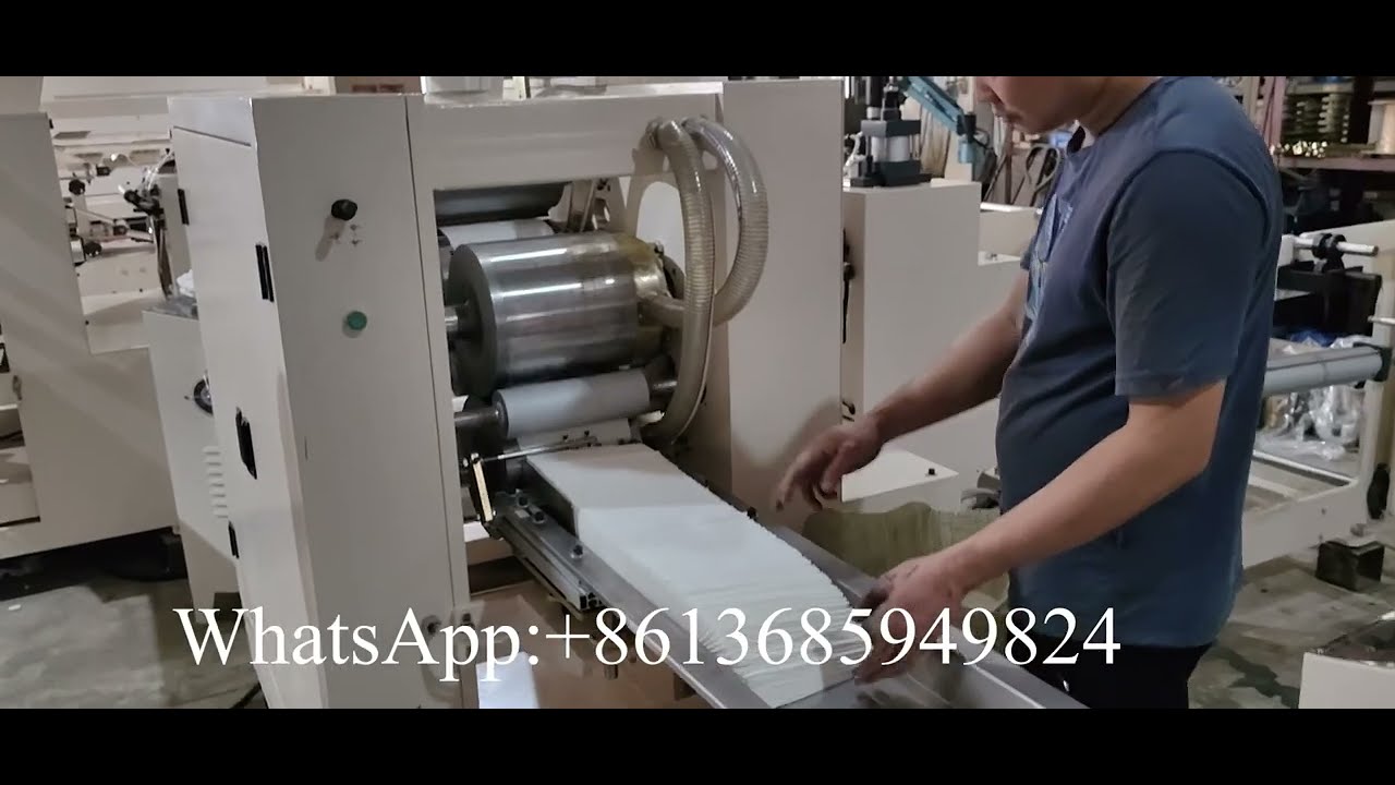 Machine pliante automatique de tissu de distributeur de 400mm - YouTube