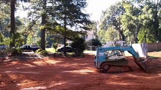 Takeuchi Track Loader Spreading Dirt