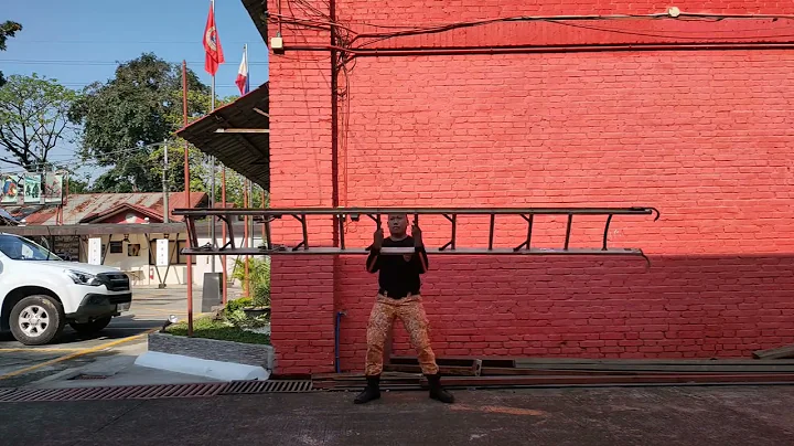 High shoulder ladder carry flip method