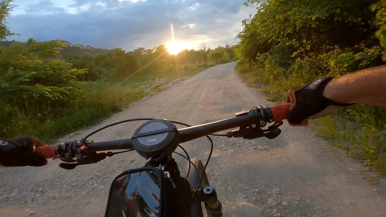 Moklishte Lake descending with the sun peeking through the clouds 🚵🌄