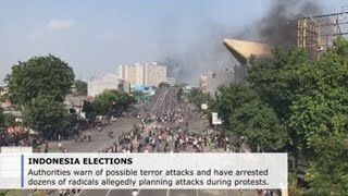 At least 6 people die in protests against Widodo re-election in Indonesia