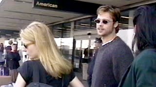 Throwback - Brad Pitt and Gwyneth Paltrow at LAX airport with a ton of luggage.