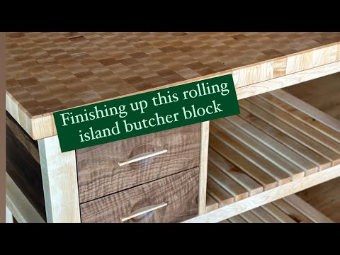 Finishing up this maple and walnut rolling island butcher block