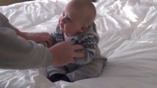 Kerplop! Cute baby boy can't keep his balance