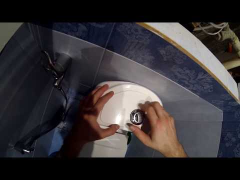 Video: Kako popraviti labav podlogu za WC?