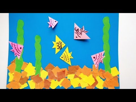 Рыбки оригами из бумаги в аквариуме