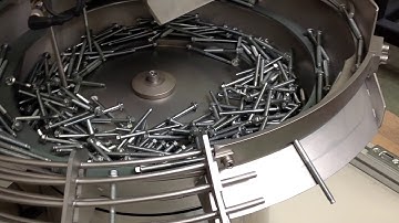 GMS Twin bowl feeders with separation tool for screw sorting.