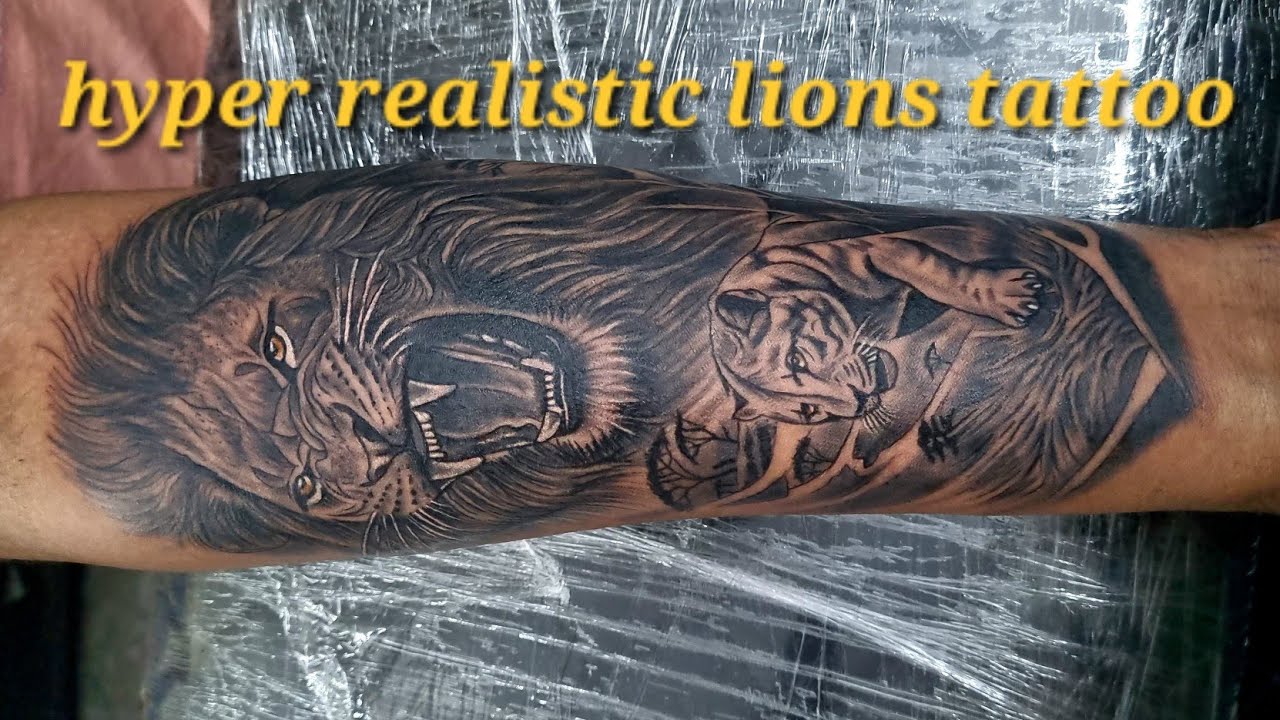 Hyper realistic lions tattoo 