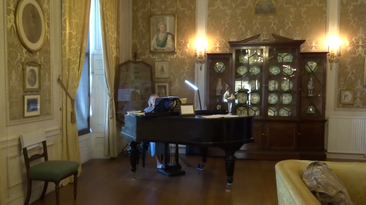 Piano music in the Drawing Room at historic Trelissick House National Trust paysite in Cornwall