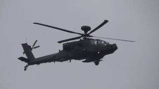 RAF Apache follows tree line east Exercise joint warrior Woodbridge 4apr17 148p dull sky