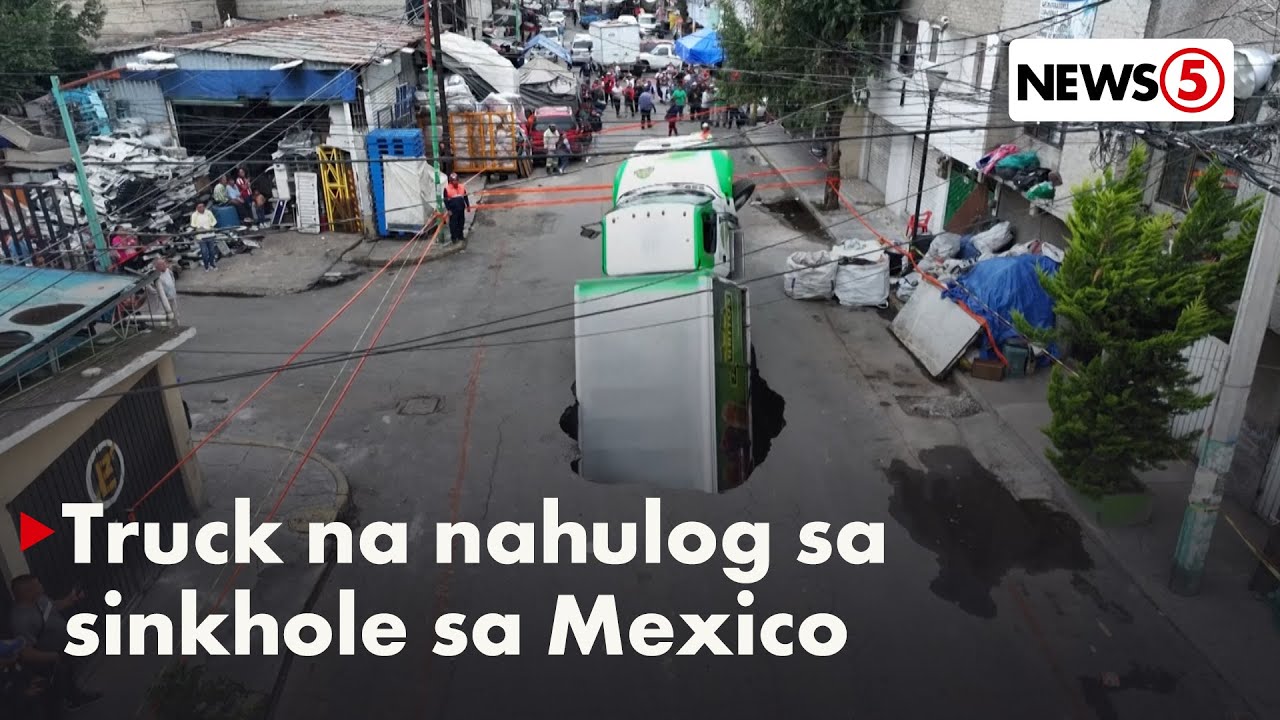 Soda truck falls into Mexico City sinkhole