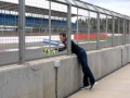 Mark webber doubling up as valentino rossis pit board man at silverstone