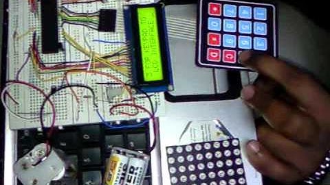 8051 microcontroller project clock,calculator,temp,lcd,keypad,7-seg comsats-ciit-atd P2
