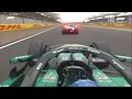Fernando Alonso waving to Sergio Perez while he gets overtaken on the 2026 Chinese GP