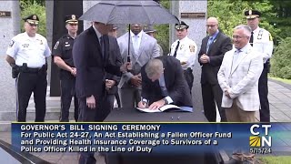 Bill signing ceremony for legislation establishing the Fallen Officer Fund