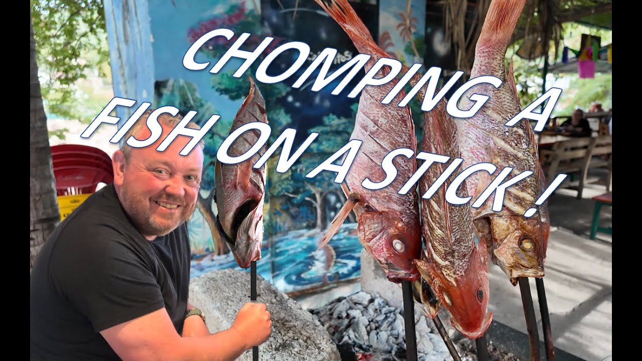 CHOMPING A FISH ON A STICK - Best kept seafood secret in the Romantic Zone