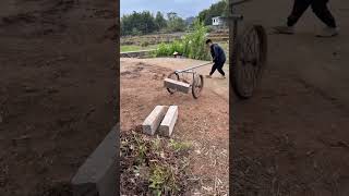 Moving Heavy Concrete Blocks with a Manual Lever Cart