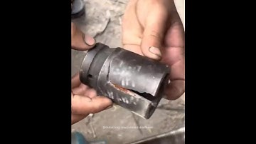 Expert mechanic demonstrates the process on a lathe to bring a broken air impact socket back to life