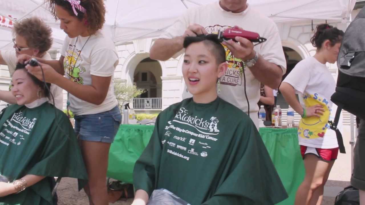 Christina Pai shaving her head to raise money for Pediatric Cancer research