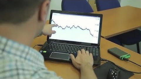 Man On Laptop Explains Data Stock Video
