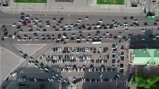 Aerial Top View Car Free Parking Space. Aerial View From Above Flying Drone Cars Moving And Standing