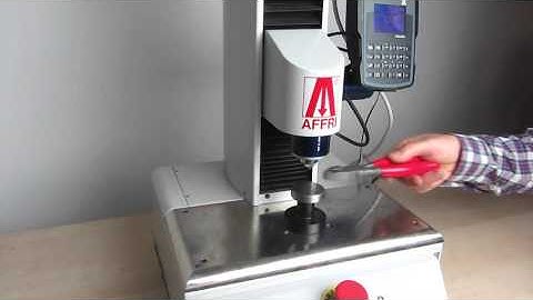 Portable hardness tester on bench support AFFRI EDA300