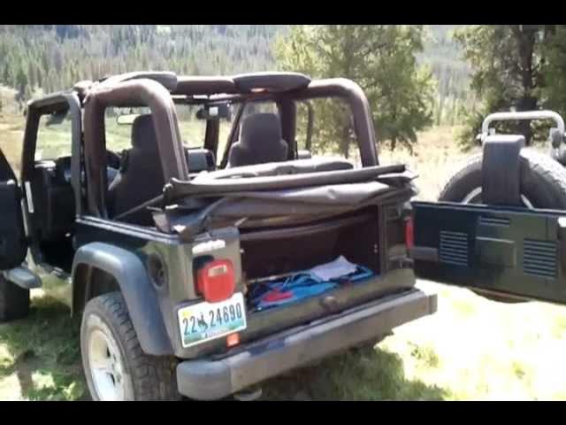 How to take the top down on your soft top Jeep - Soft top removal - YouTube