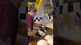 POV: the dough doesn’t divide itself.Just two flour-covered humans .