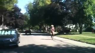 Clown Rides a Unicycle in the Street Shirtless!!