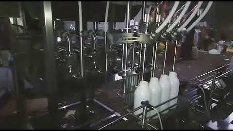 SWANPACK PESTICIDES BOTTLE FILLING MACHINE