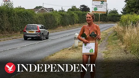 Mother stages naked protest to get foliage trimmed to allow access for disabled daughter