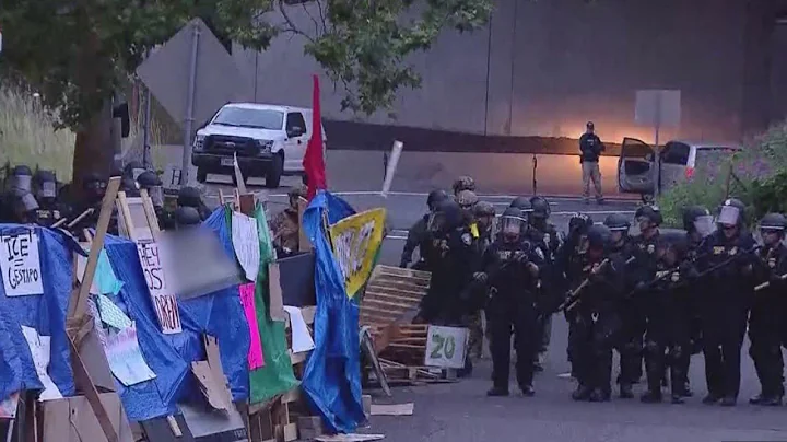 Standoff between ICE protesters and federal police continues