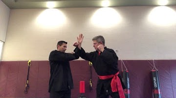 Kung Fu - Wide Hook Counter with "X" Block to Forearm Rack for Straight Arm-Bar Takedown
