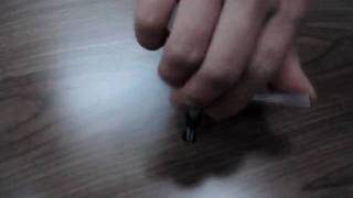 fixing the base on Eames stool 1