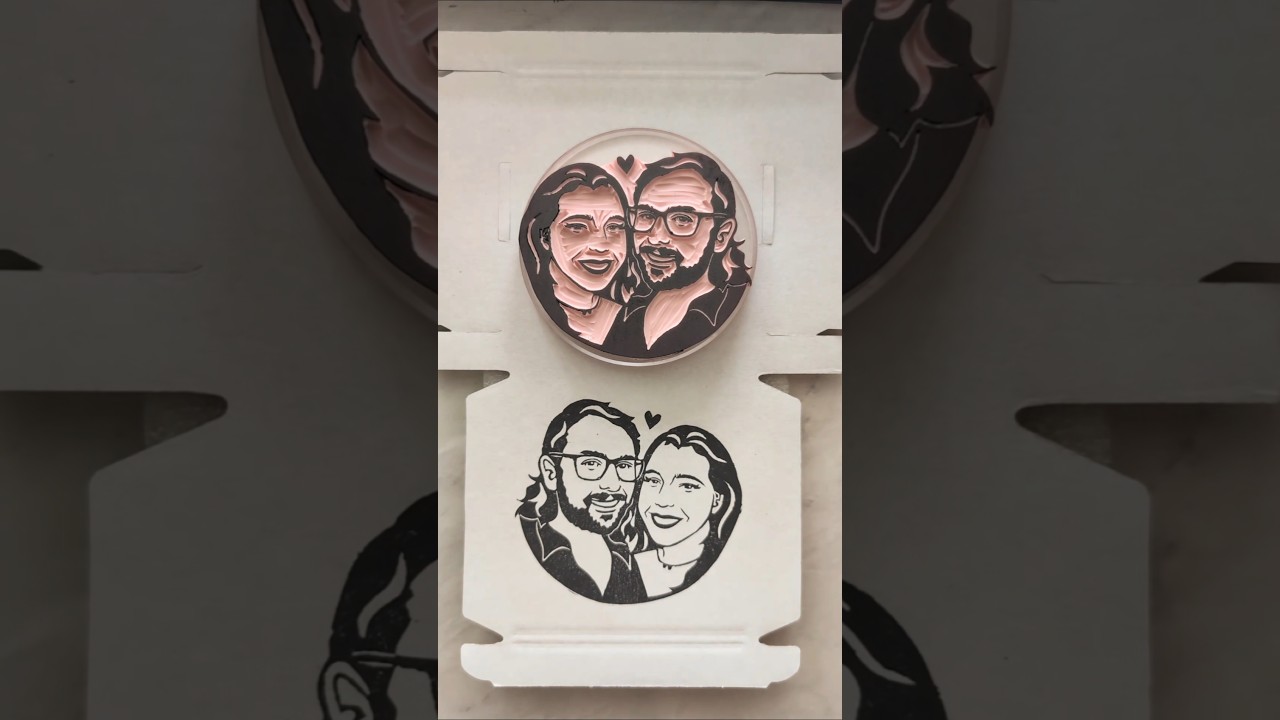 Hand carving a lovely couples portrait stamp 