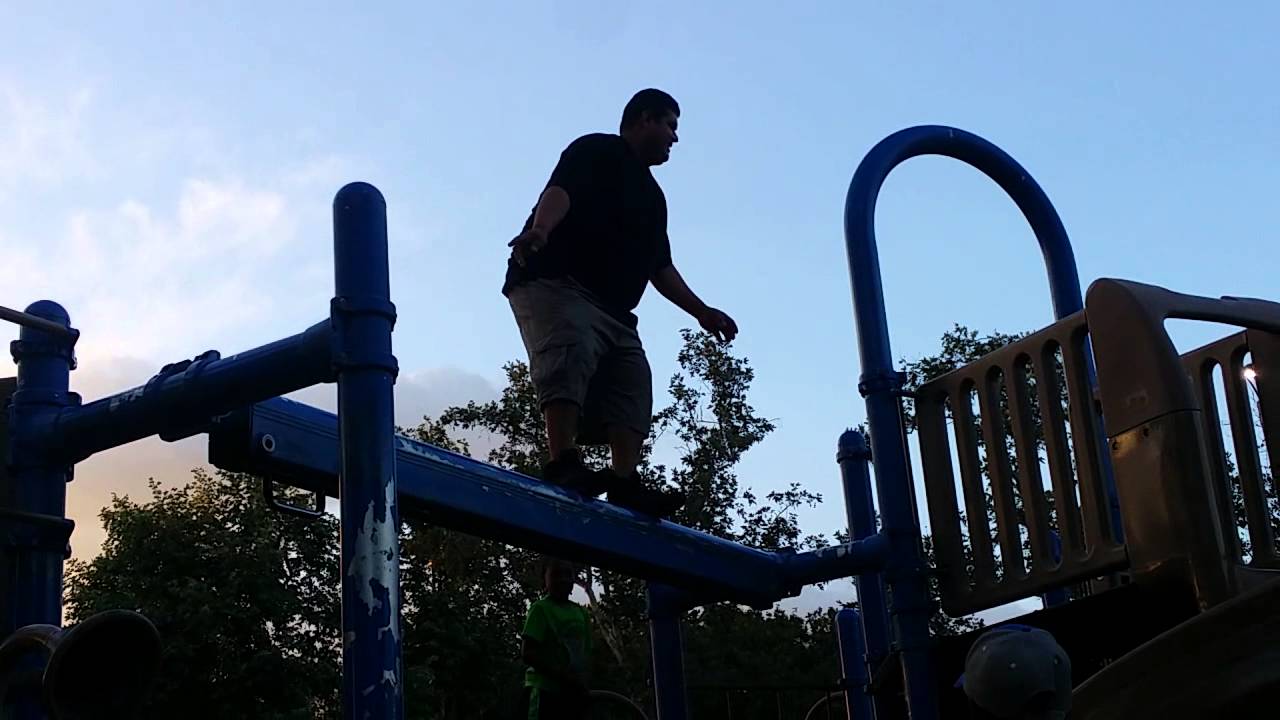 Man Falling From Playground. kookie inc