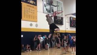 Ref gets ball unstuck out of the hoop